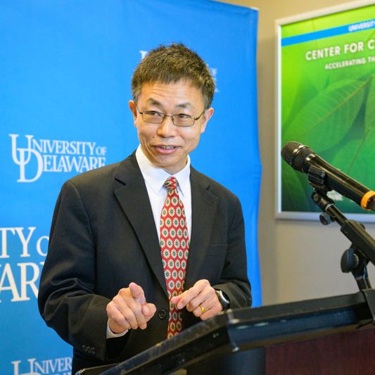 UD student and professor working in a lab together