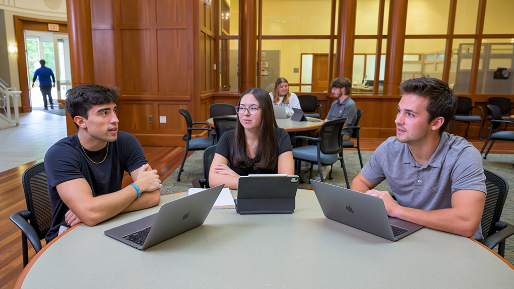 Lerner-Marketing_Photos-EK-092424 Students sit together at a table with their computers open.