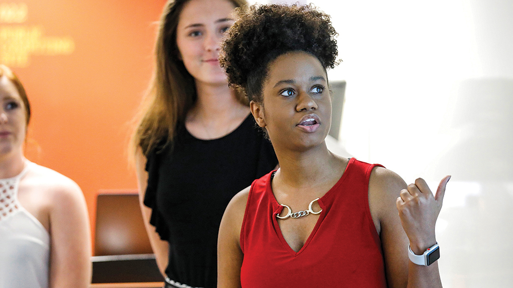 lerner-management Student Engaged in Conversation