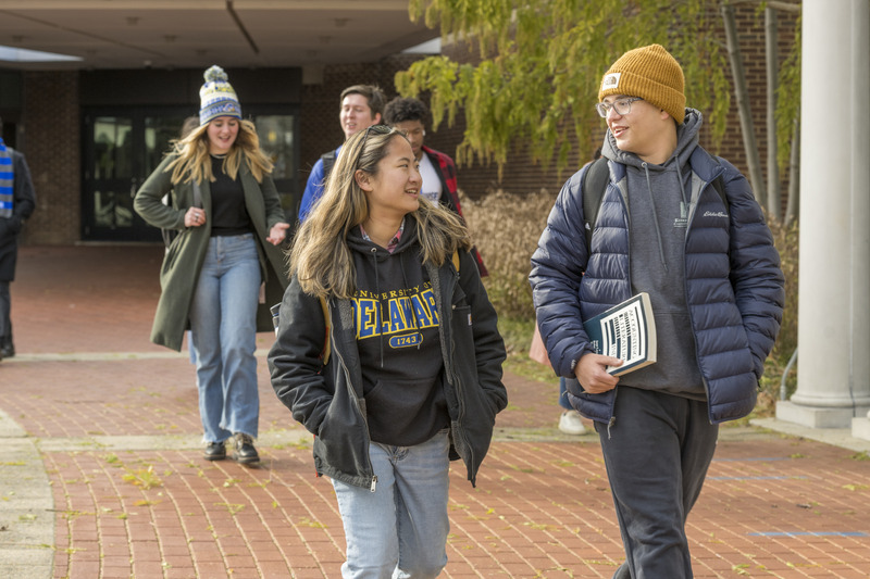 Students walking on campus.