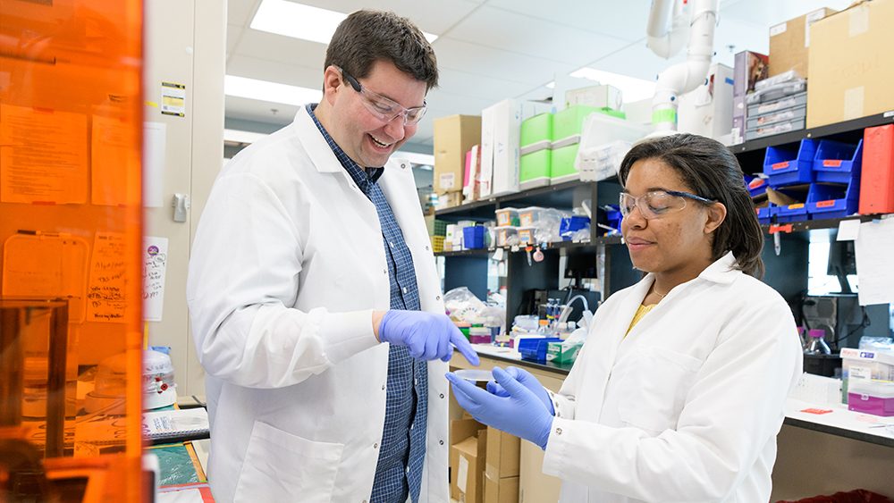 university of delaware engineering students working in a lab