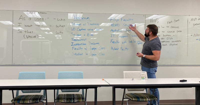 Ryan Eagan, a student in UD’s College of Earth, Ocean and Environment, works on UD Study AiDE, an artificial intelligence development project that will lead to a suite of learning tools for UD students.