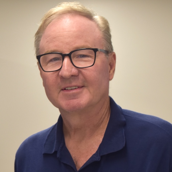 Headshot photo of Mark Parcells
