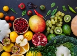 Background photo showing a variety of healthy food such as fruits and vegetable