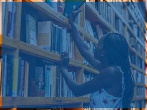 Background photo of a girl in a library