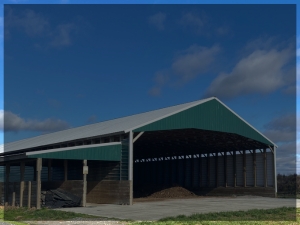 A chicken house with litter in it