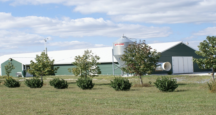A photo of the front of the ENVIRON Center at the Jones Hamilton Environmental Poultry Research House