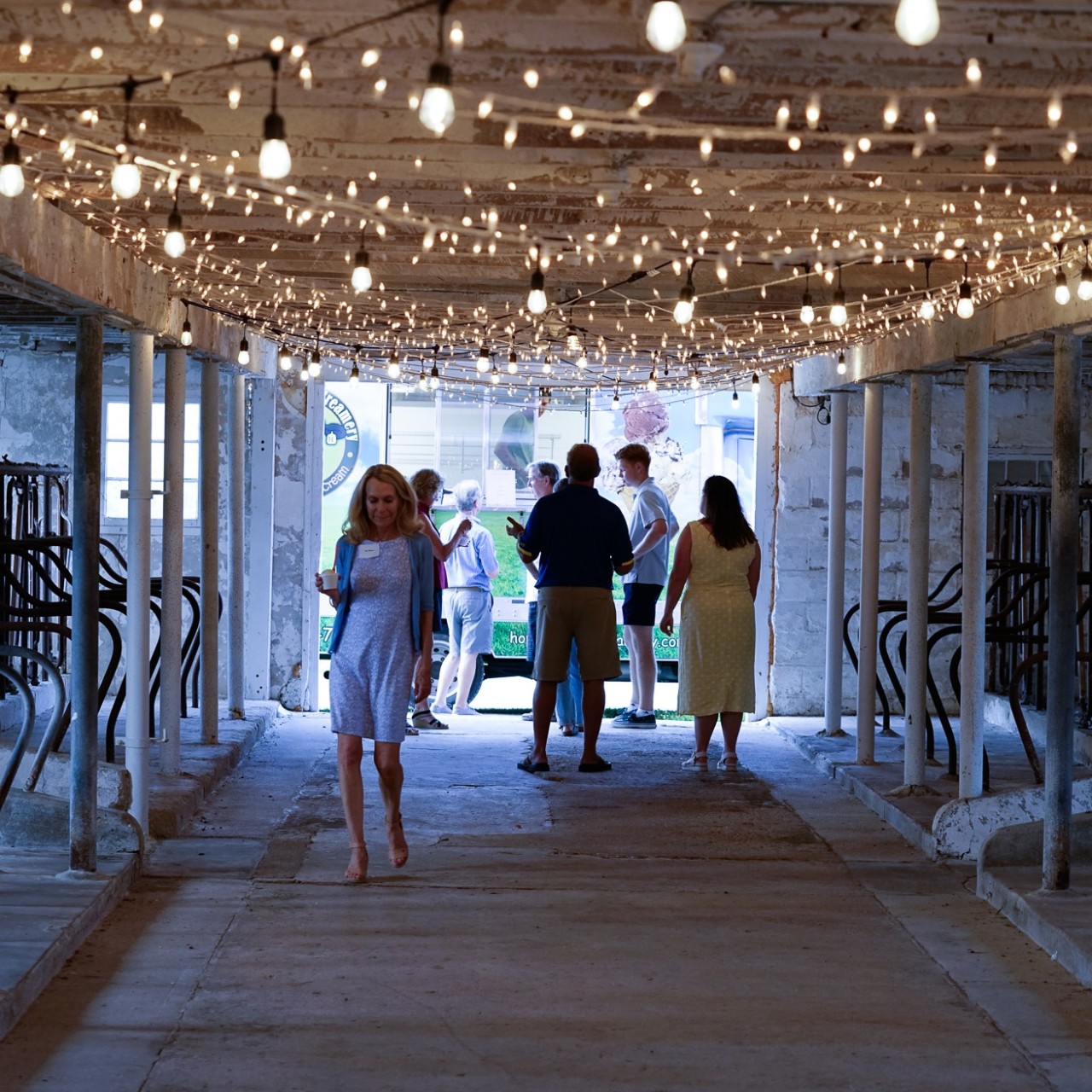 A gorgeous barn with faiy lights.