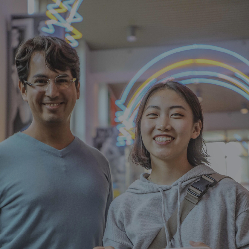 A photo of two students at Coffee Hour