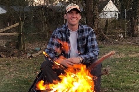 Nico Repolle next to a fire