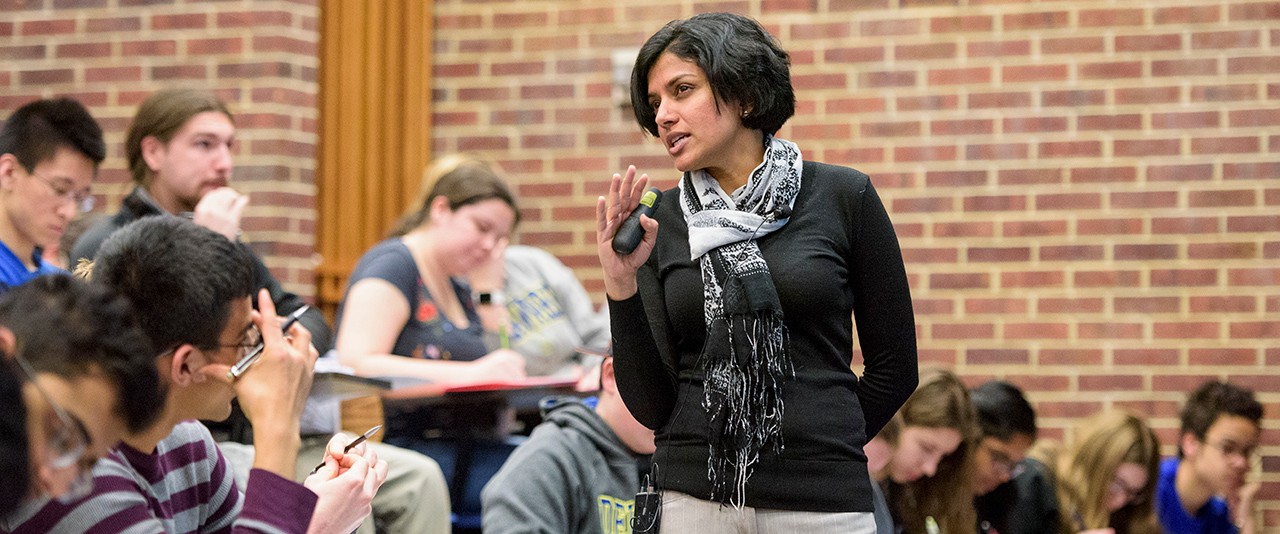 UD faculty member speaks to a class