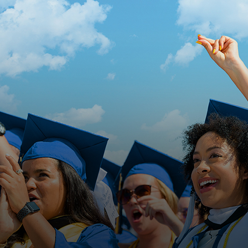 students in caps and gowns