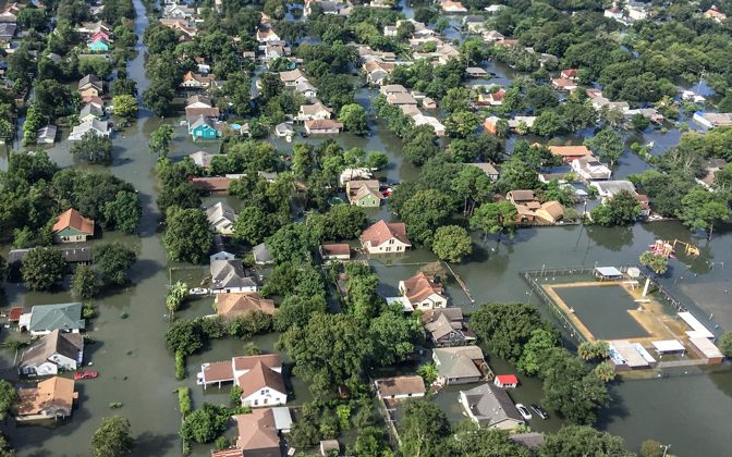 aerial photo of a flooded community