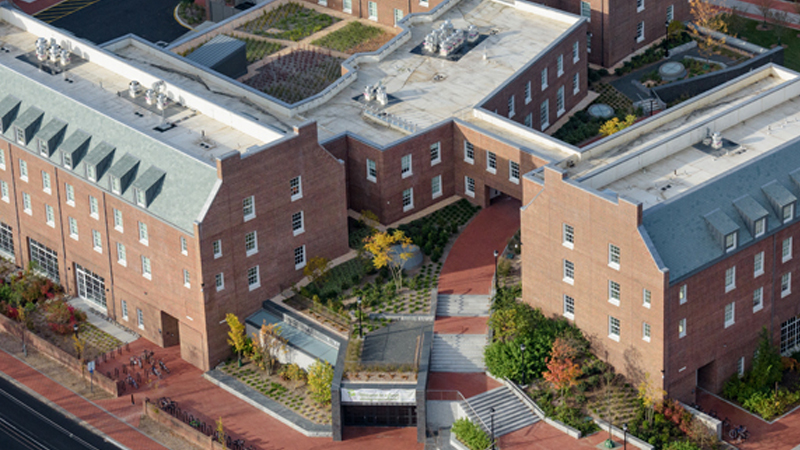 Arial view of Caesar Rodney complex with three connected buildings and brick walkways around the complex.