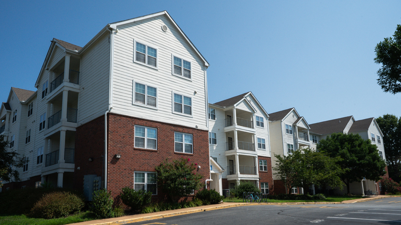 University Courtyard Apartments building 200 and part of the parking lot.