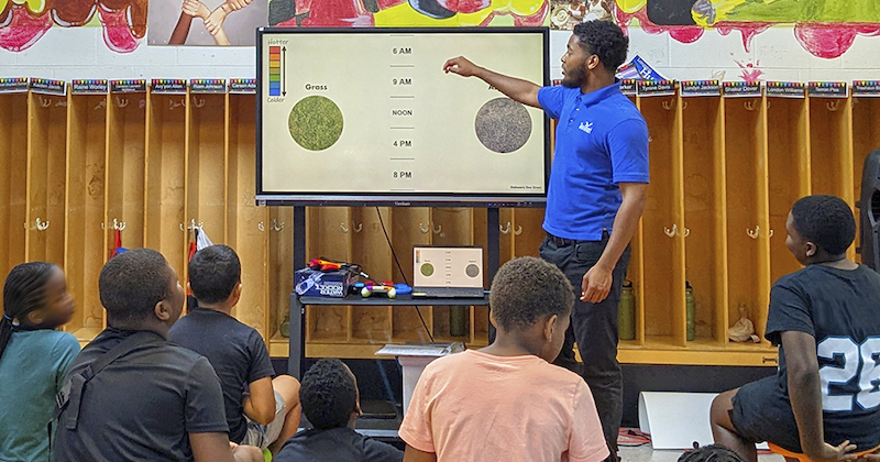 UD student teaching middle schools students about science