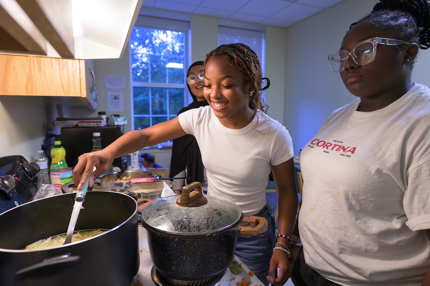 Edge students cook for each other during a cultural food night.
