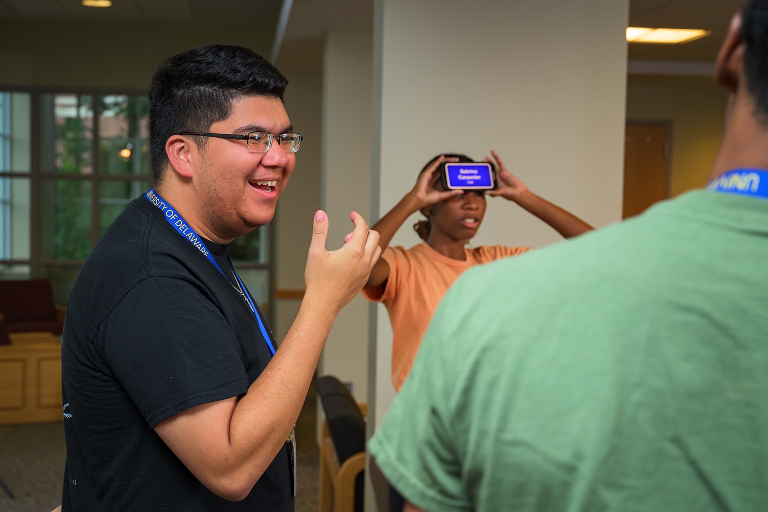 Edge students playing icebreaker games in the evening in a residence hall.