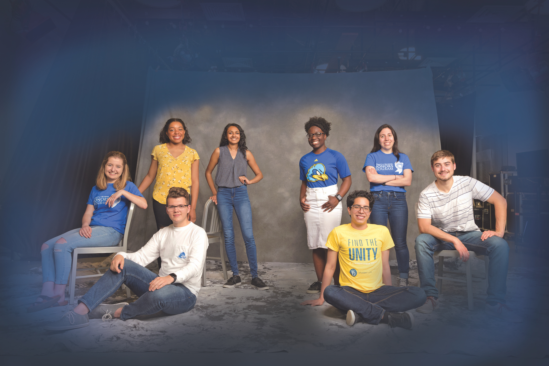 group of ud honors students posing in a photo studio