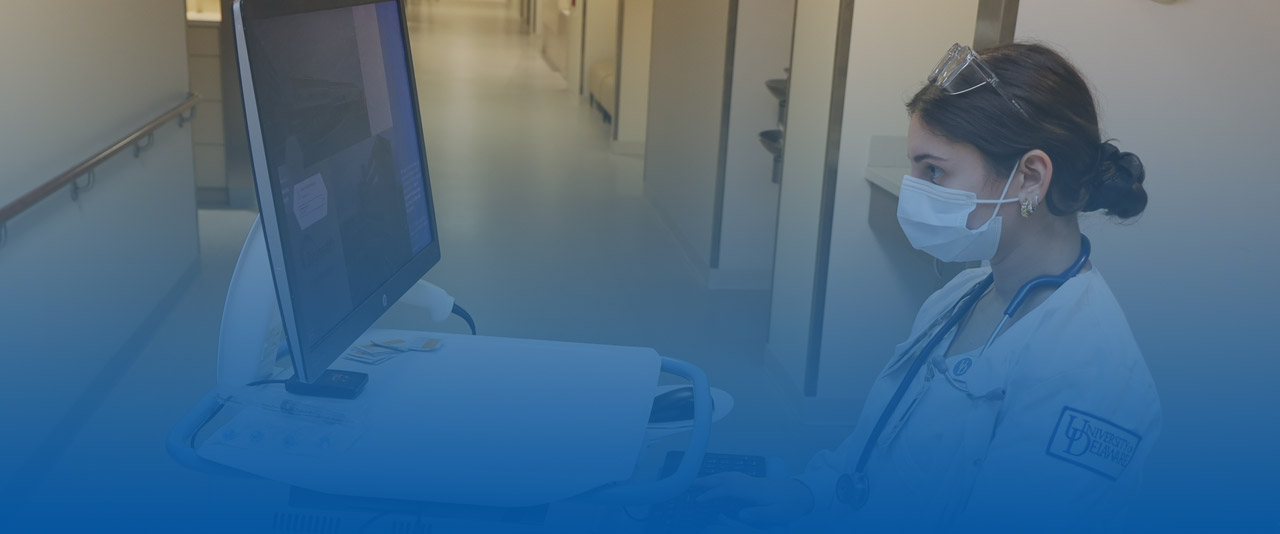 Pathways to a Degree in Nursing Nursing student at a machine.