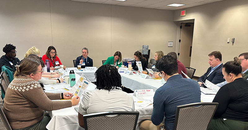 Photo of Scott Abbott leading a roundtable conversation with educators at the 2026 Delaware Dialogues conference