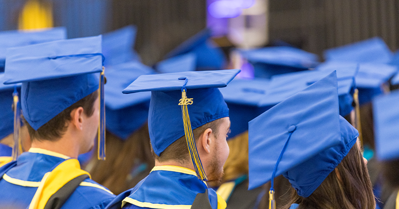 Biden School MPA Graduation 2025: MPA students with graduation caps and gowns on