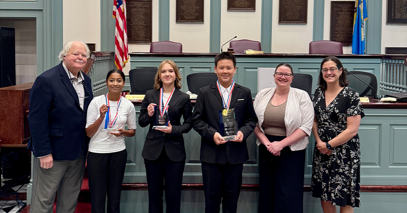 Participants and leaders of the 2026 Delaware National Civics Bee pose for a photo