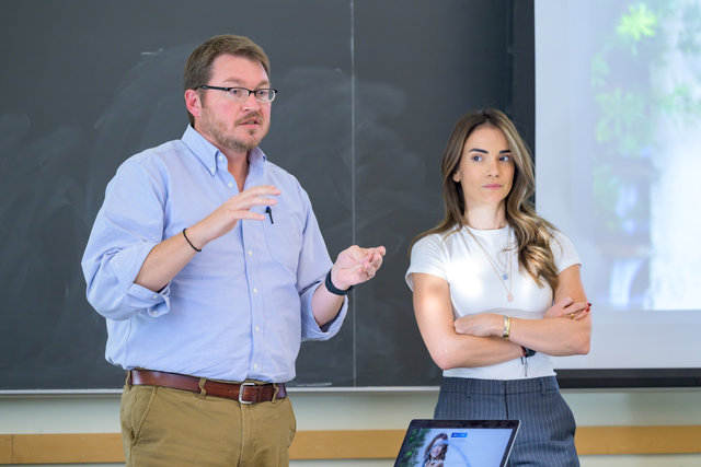 Senior Fellow Anna-Kynthia Bousdoukou and Dr. Tim Shaffer teaching a classroom