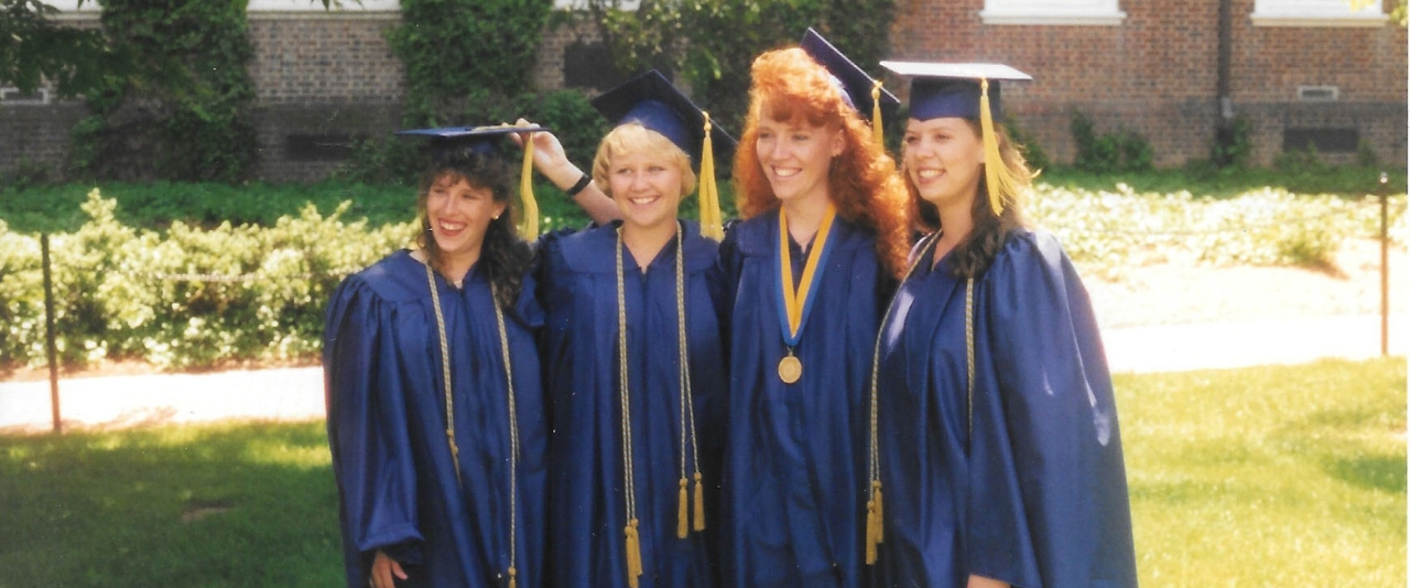 Kimberly (Alexander) Gaines, Rebecca (O’Day) Adams, Debbie (Short) Kirk and Elaine (Zeitler) Webb at their 1995 graduation.