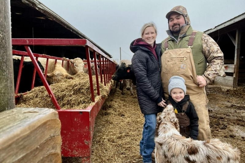 Jenell Eck McHenry on her family farm with her husband Joey and son Lee.
