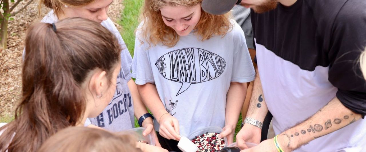 Students simulate natural resource management through a fishing derby activity. 