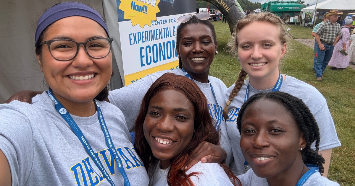 CEAE students and staff pose at an event.