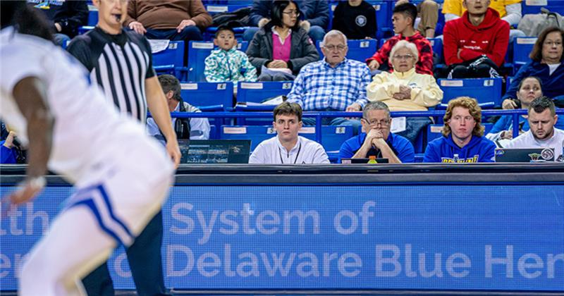 Colin Pie on the sidelines of a UD basketball game