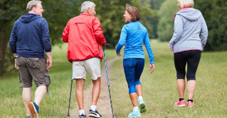 A group of older adults walking and takling together