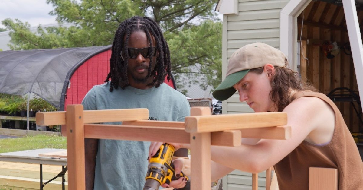 Students and staff build Adirondack chairs.
