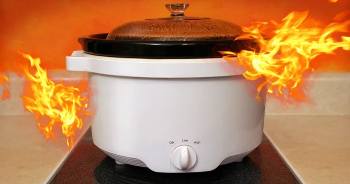 A multicooker dramatically on fire.