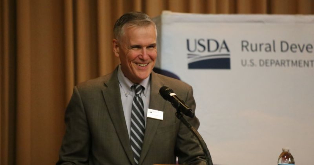 Glendenning receiving a Presidential Rank Award for meritorious achievement in 2023.