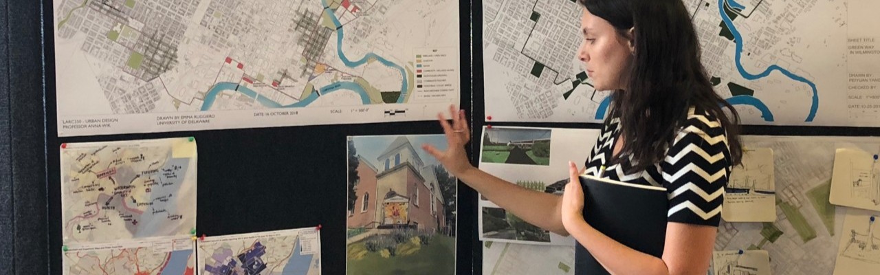 Female student presenting urban landscape designs