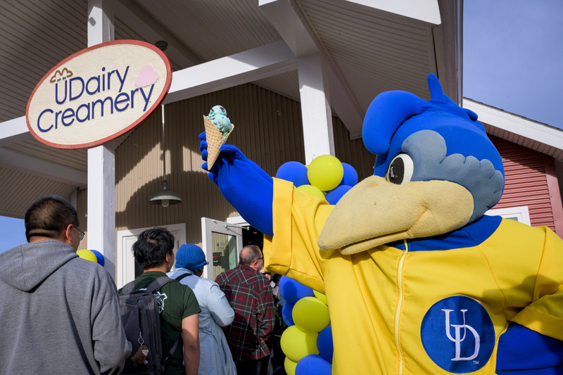 YoUDee stands in front of the UDairy Creamery