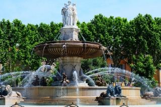 View on a sunny day of a historic fountain in the French city of Aix-en-Provence