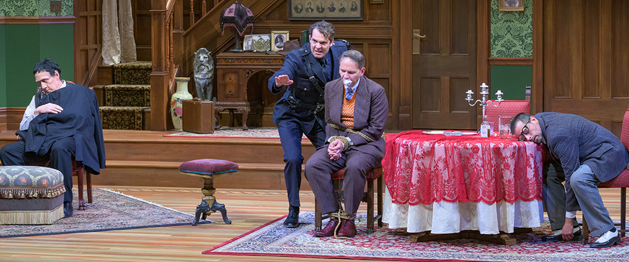 Four actors on stage during Arsenic and Lace performance