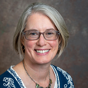 Headshot photo of Eve Buckley