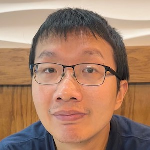 Headshot photo of Juntao Huang
