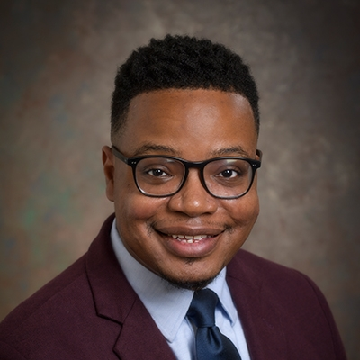 Headshot photo of Cresean Hughes