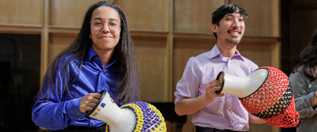 Photo of two students from the World Percussion Ensemble, taken November 15, 2022.