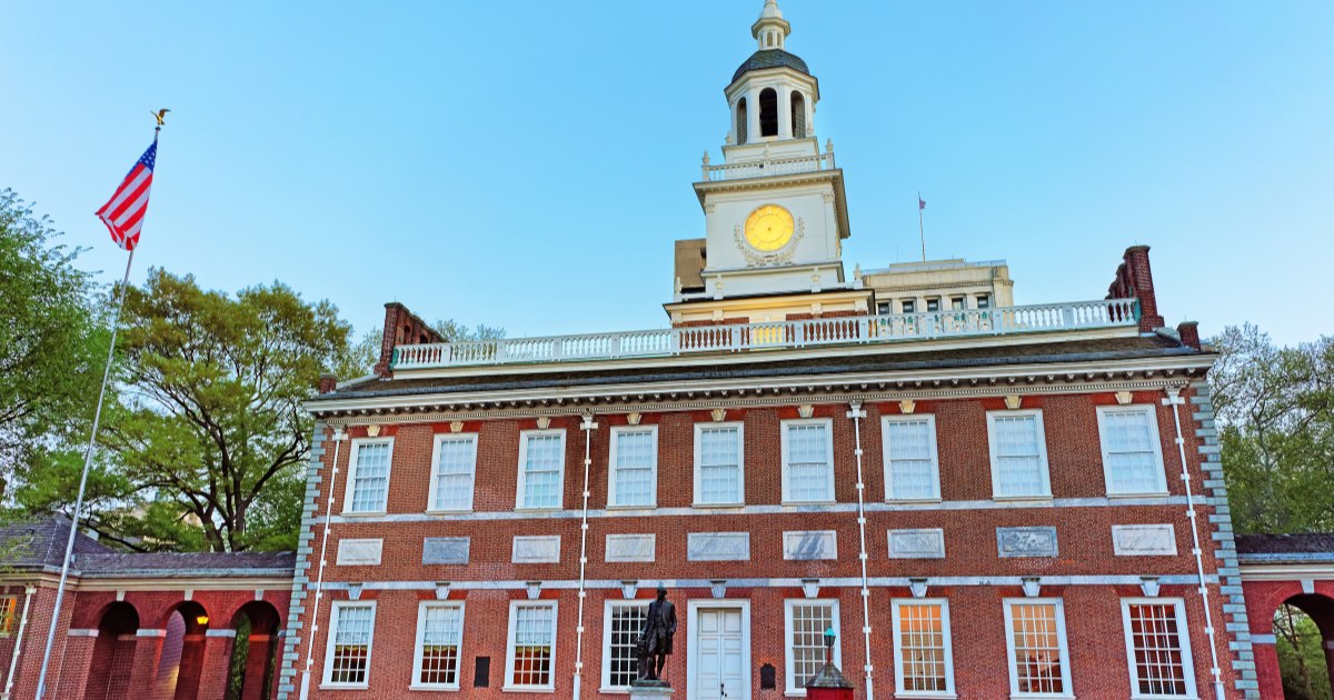 Independence Hall on Chestnut Street in Philadelphia at dusk. Photo by romanbabakin