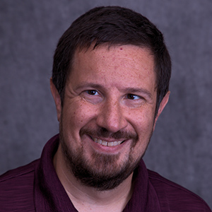 Headshot photo of Trevor Daly