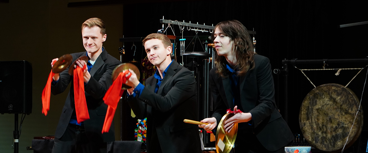 Percussionists on stage performing