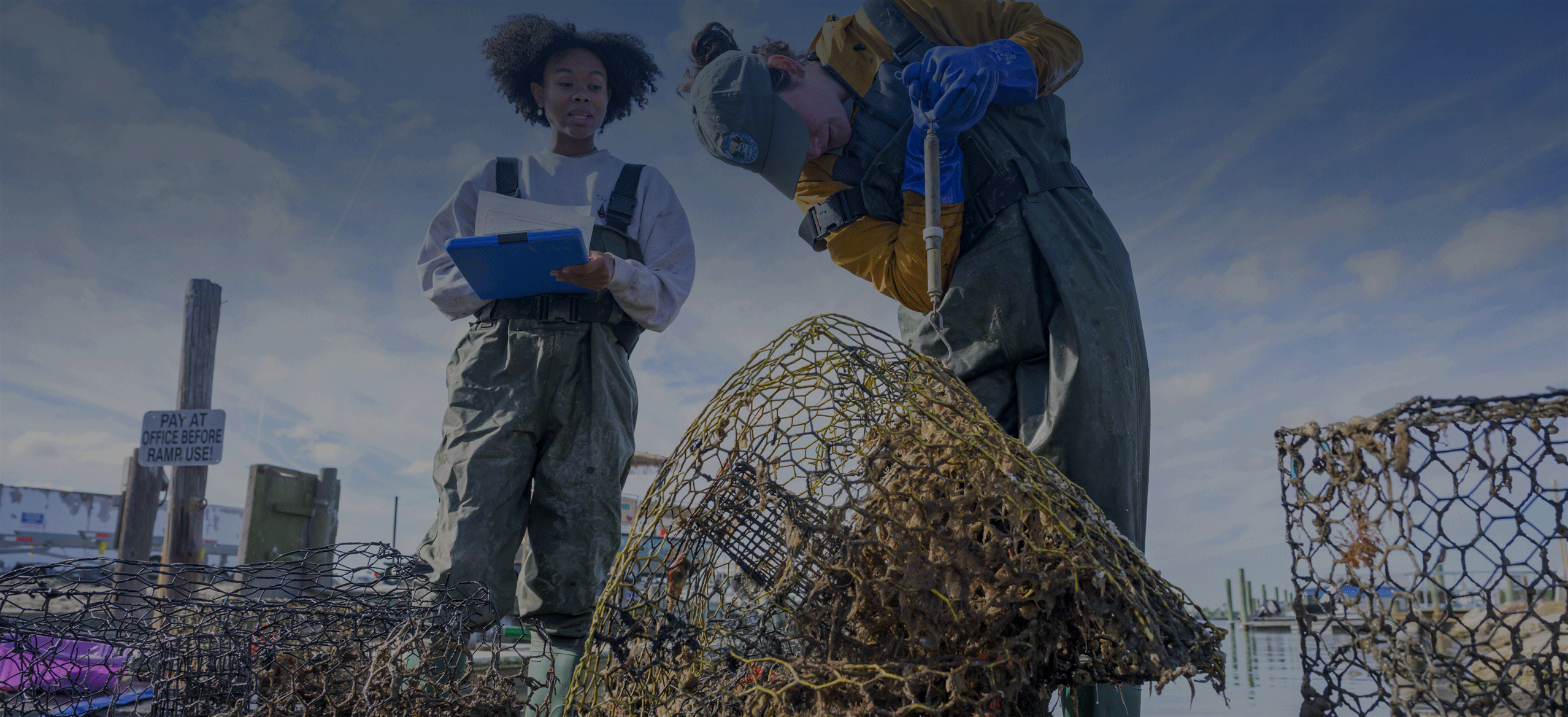 Volunteers cleaning derelict crab pots