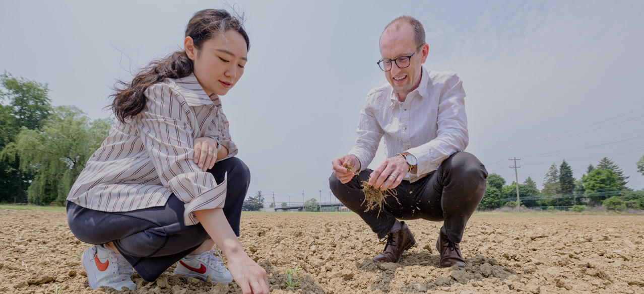 UD geography doctoral candidate Dongyang Wei and faculty Kyle Davis